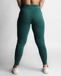 LYFTLYFE joggers in green back profile highlighting glute-contouring fit. 