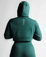 Rear shot of LYFTLYFE women's hoodie in green with relaxed fit.
