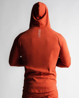 Rear view showcasing LYFTLYFE red hoodie’s fitted back and hood structure.