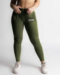 LYFTLYFE women’s joggers in green, front view highlighting stretch and form fit. 