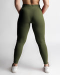 Women’s joggers in green, back profile with sculpted athletic shaping. 