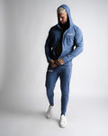 Full-body outfit with Function hoodie unzipped, paired with matching joggers in blue. 