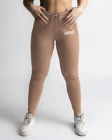 LYFTLYFE women’s joggers in taupe, shown from the front with athletic fit. 