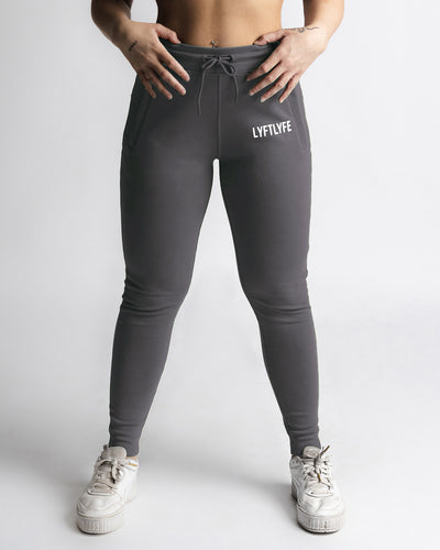 LYFTLYFE women’s joggers in grey, shown from the front with athletic fit.