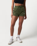 Women’s Balance Shorts in green with a soft cotton-polyester blend, tonal drawstring and a white LYFTLYFE logo. 