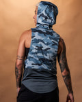 Women’s sleeveless hoodie in blue camo, shown from back side, showcasing a relaxed hood and moisture-wicking technology.