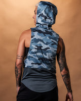 Women’s sleeveless hoodie in blue camo, shown from back side, showcasing a relaxed hood and moisture-wicking technology.