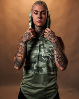 Women’s sleeveless hoodie in green camo, crafted with a loose fit and a moisture-wicking triple-blend fabric for ultimate comfort.