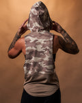 Back view of the Women’s sleeveless hoodie in brown camo, crafted with a loose fit and a moisture-wicking triple-blend fabric for ultimate comfort.