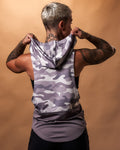 Back view of the Women’s sleeveless hoodie in purple camo, showcasing a relaxed hood and moisture-wicking technology.