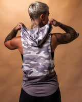 Back view of the Women’s sleeveless hoodie in purple camo, showcasing a relaxed hood and moisture-wicking technology.
