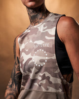 Detailed shot of the Lyftlyfe branding on the brown camo sleeveless shirt, positioned on the upper left chest.