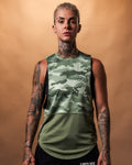Front view of the Women’s Command Cut Sleeve in green camo, highlighting its athletic design and premium performance fabric.
