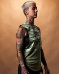 Women’s sleeveless gym tank in green camo, displayed from the right side, highlighting its curved hem and durable triple-blend fabric.