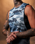 Close-up of the white Lyftlyfe logo on the left chest of the Women’s Command Cut Sleeve tank in blue camo.