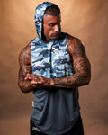 Men’s sleeveless gym hoodie in blue camo, highlighting its curved hem and durable triple-blend fabric.