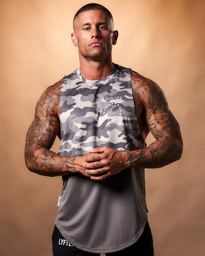 Mens Tank top in 2 panels. Top panel is camo and the bottom is Ash gray.