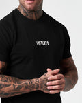Close-up of the white LYFTLYFE logo on the chest of the Contour Men’s T-Shirt in black, adding a premium touch.