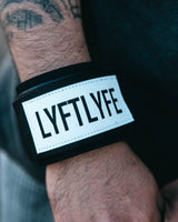 Close-up of wrist wearing wrap with "LYFTLYFE" patch visible on the opposite side.