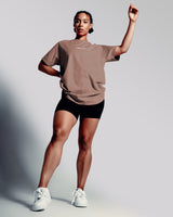 Front view of the Contour Women’s Oversized Tee in rose color, designed with high-performance cotton and a soft, breathable second-skin feel.