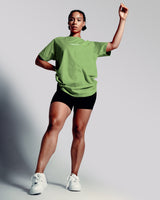 Women’s Contour Oversized Tee in light green, crafted with wrinkle-resistant fabric and a sleek Lyftlyfe chest logo.
