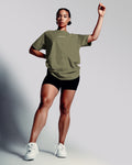 Front view of the Contour Women’s Oversized Tee in green, designed with high-performance cotton and a soft, breathable second-skin feel.