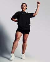 Women’s oversized Contour T-shirt in black, featuring a relaxed fit, moisture-wicking cotton blend, and a white Lyftlyfe logo.