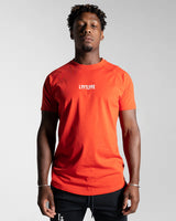 Front view of the Contour Men’s T-Shirt in red, crafted from moisture-wicking, high-performance cotton with a second-skin feel.
