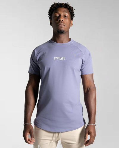 LYFTLYFE contour t-shirt in lavender with white logo on light grey. 