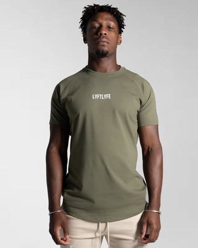 LYFTLYFE contour t-shirt in olivine green with white logo on light grey. 