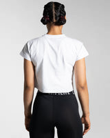 Fitted Drill Women’s Tee in white, shown from the back, featuring advanced cotton blend fabric and a stylish cropped design.