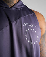 Close-up of the white Lyftlyfe logo on men’s purple hooded tank top.