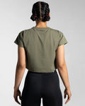 Back view of the cropped Drill Tee for women in olive green, highlighting the regular fit and breathable stretch cotton fabric.