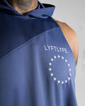 Close-up of the white Lyftlyfe logo on men’s blue hooded tank top.