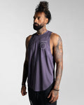 Men’s sleeveless gym tank in purple, shown from the left side, highlighting moisture-wicking fabric for breathability.