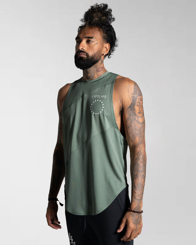 Mens 3 panel tank top in green with white logo on left chest.