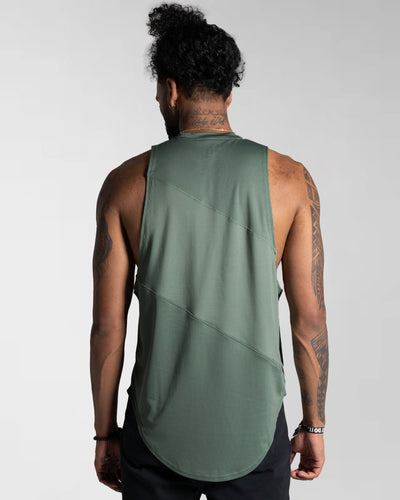 Men’s sleeveless gym tank in green, designed with wide arm openings and moisture-wicking fabric for breathability.