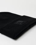 LYFTLYFE black toque laid flat with front-facing black rubberized patch.