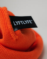 LYFTLYFE logo tag sewn into orange fleece-lined toque.