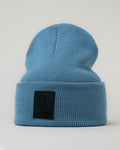 Structured thick fleece beanie in blue color displayed from front view.