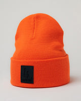 Structured thick fleece beanie in oragne color displayed from front view.