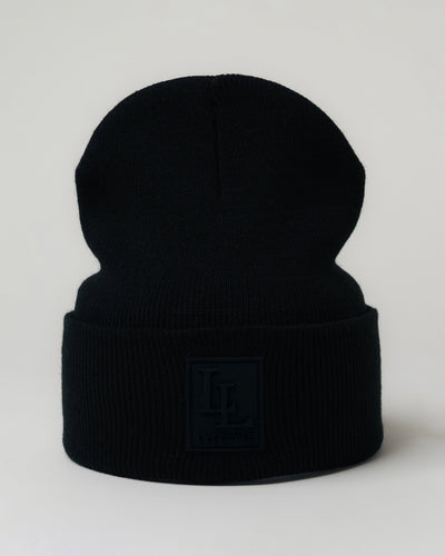 LYFTLYFE black toque laid flat with front-facing black rubberized patch.