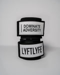Pair of LYFT wrist wraps stacked, showing "DOMINATE ADVERSITY" and "LYFTLYFE" branding.