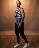 Side view of Women’s Command Cut Sleeve in blue camo with antibacterial, anti-odor, and sweat-wicking fabric for high-performance workouts.