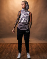 Women’s Command sleeveless hoodie in purple camo, showcasing a relaxed hood and moisture-wicking technology.
