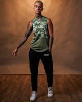 Front-facing shot of the Lyftlyfe Women’s Sleeveless Hoodie in green camo, designed with a white LYFTLYFE logo and a soft, lightweight hood.