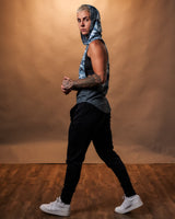 Women’s Command sleeveless hoodie in blue camo, shown from the left side, showcasing a relaxed hood and moisture-wicking technology.