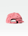 Rear view of red acid wash dad hat showing adjustable strap and faded cotton texture.