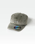 LYFTLYFE logo dad hat in green showing acid wash texture and structured front panel.