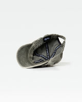 LYFTLYFE green dad hat interior close-up, featuring branded sweatband and care instructions.